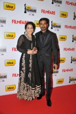 Dhanush with wife Aishwarya on the Red Carpet of _60the Idea Filmfare Awards 2012(South).jpg